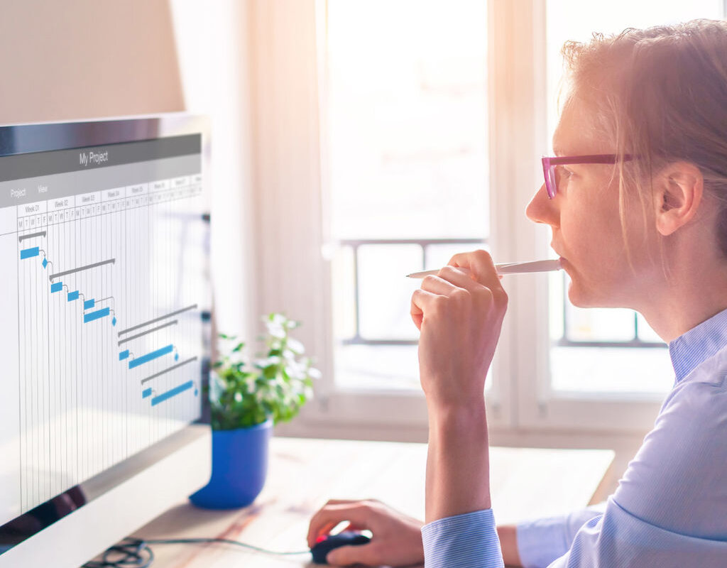 female employee in front of computer